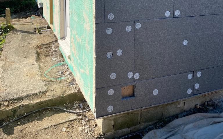 Elevate Energy Efficiency: Spray Render Services for External Wall Insulation.